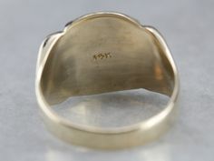 Crafted of 14 Karat yellow gold, this handsome piece has simple shoulders and features a bold shape and a perfect polish. The engraving on this vintage signet is so sleek and graphic, we've left it be on the off chance that we can find someone with the initials "GM" who likes it as much as we do! Metal: 14K Yellow Gold Top Measurements: 15 x 12 mm, Cushion Monogram: "GM" in Bold Font Ring Size: 10 Marks: "14K" Stamped on the inside band Mens Gold Signet Rings, Yellow Gold Sapphire Ring, 10 Marks, Gm Monogram, Top Measurements, Gold Signet Ring, Cameo Ring, Gold Top, July Birthstone