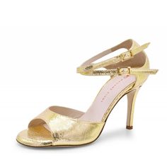 Lovely bright platinum gold embossed leather, fabulously elegant, neutral yet a show stopping design! The double ankle strap with closed back keeps your foot securely in the shoe at all times, from red carpets to dance floors. You can wear the ankle straps crossed or parallel, as the mood strikes you. This sandal beautifully supports your foot with the single toe band. The shoe is finished with a subtle signature brilliant adornment on the left heel. With a soft memory foam foot bed padding, you Luxury Gold Sandals With 4-inch Heel, Luxury Metallic Heels With Deep Heel Cup, Gold Sandals With Sculpted Heel For Gala, Gold Heels With Heel Loop For Formal Occasions, Evening Dance Shoes With 4-inch Heel, Metallic Ankle Strap Heels With Padded Heel, Luxury Gold Heels With Heel Loop, Metallic Heels With 4-inch Heel For Gala, Chic Metallic Heels With Heel Loop