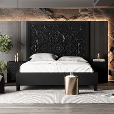 a large bed sitting in a bedroom on top of a hard wood floor