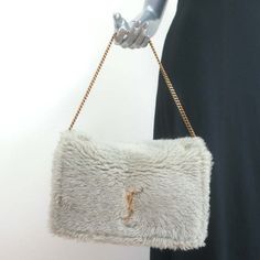 Saint Laurent Kate Shearling Medium Reversible Shoulder Bag Beige Suede Gently Used. Great Condition. No Major Wear To Speak Of, 2 Small Brown Smudges On Right Side. Comes With Dustbag. Retails For $2,990! *Gold Hardware* Bag Height 8" Bag Length 10.5" Bag Depth 2.75" Strap Drop 8.5" Yves Saint Laurent Bags, Oversized Sunglasses, To Speak, Blue Bags, Sneakers Black, Brown Gold, Chain Strap, Right Side, Gold Hardware