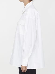 Leo Pocket shirt in white cotton. It features pointed collar, front button closure, two flap pockets on chest, buttoned cuffs and curved hem. Oversized fit. The model is 180cm tall and wears size IT 40. Size nationality: IT Product number: 3587495 Product code: ARMTMT005C003001 Composition: 100% cotton Platform Wedge Heels, Pleats Please Issey Miyake, Pocket Shirt, Jeans Jumpsuit, Premium Brands, Dress With Cardigan, Clothes Collection, Cardigan Jacket, Skirt Suit