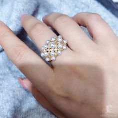 Highline: Famous Style Product Information OriginJapan MaterialAkoya Pearl, 18k Gold, and Natural Diamonds DimensionsRing Weight 12.0 g Pearl Shaped: Round Size: 2.5-4.5 mm Quality: AAA Nacre: Very Thick Color: White Luster: Very High Accessories Metal: 6.1 g of 18k Gold Other: 0.52 ct of SI Quality Natural Diamonds White Akoya Pearl Rings With Diamond Accents, Luxury Diamond White Pearl Promise Ring, Luxury Diamond White Pearl Ring For Promise, White Pearl Ring With Rose Cut Diamonds, White Pearl And Diamond Open Ring, Gold Pearl Ring With Diamond In Round Cut, White Diamond Pearl Ring, Luxury Pearl Ring With Rose Cut Diamonds For Anniversary, Luxury Pearl White Akoya Pearl Rings