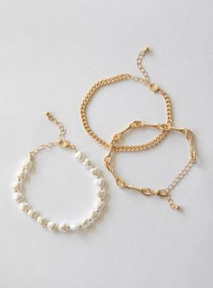 Bracelet pack Princess Polly exclusive 50% steel 30% acrylic 10% brass 10% zinc alloy Pack of three Lobster clasp fastening Gold-toned Pearl detailing Style one length adjusts from: 17.5cm - 22.5cm / 6.8in - 8.8in Style two & three length adjusts from: 19cm - 24cm / 7.4in - 9.4in Gold Bangle Set, Bracelet Pack, Gold Accessories, Gorgeous Bracelet, Bangle Set, Charm Gift, Gold Bangles, Princess Polly, Accessories Bracelets