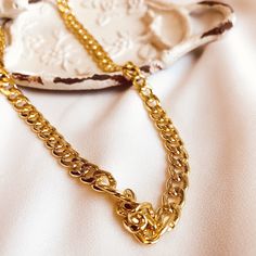 This stylish Cuban chain is super trendy at the moment, works for any street style you have in your closet!Item Details: • This listing is for ONE(1) Cuban chain necklace• 14k gold-filled, width 6mm.• Model wearing 16 inches. Trendy Tarnish-resistant Choker Necklace, Trendy Curb Chain Necklace For Gift, Elegant Cuban Link Necklace With Chunky Chain, Elegant Cuban Link Necklace With Chunky Chain For Gift, Trendy Gold Cuban Link Necklaces, Trendy Gold Cuban Link Necklace, Trendy Yellow Gold Curb Chain Necklace, Trendy Gold Oval Link Necklace, Trendy Cuban Link Gold Chain Necklace