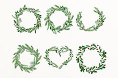 watercolor christmas wreaths with red berries and green leaves