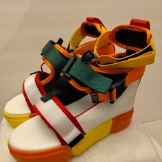 Orange, Red, Yellow And Green Color. Velcro Closure At Ankle And Across Forefoot. Never Worn. Woman 6.5 Bold Wedge Heel Sandals For Summer, Bold Ankle Strap Sandals For Spring, Bold Summer Sandals With Wedge Heel, Bold Open Toe Synthetic Sandals, Bold Synthetic Open Toe Sandals, Platform Sandals With Ankle Strap For Streetwear, Ankle Strap Platform Sandals For Streetwear, Bold Sandals With Heel Strap For Summer, Streetwear Ankle Strap Platform Sandals