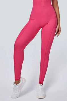 This jumpsuit enhances workouts with its open back for ventilation and stylish racerback detail. It features rear ruching for a flattering look, is designed to sculpt and lift the glutes, and includes removable pads for comfort and versatility. The half-zip closure is convenient for adjustable coverage, and its stretchy design contours to the body, allowing flexible movement. It's suitable for any occasion, blending fashion and function, ideal for active lifestyles. Fabric: Skin-friendly Super s Squat Proof Solid Yoga Pants For Running, Functional Activewear With Contoured Waistband For Gym, High Stretch Activewear With Contoured Waistband For Training, Solid Color Squat Proof Yoga Pants For Training, High Stretch Training Activewear With Contoured Waistband, Solid Squat Proof Yoga Pants For Training, Solid Color Yoga Pants With Contoured Waistband For Workout, Micro-elastic Racerback Activewear For Training, Full Length Activewear With Contoured Waistband For Gym