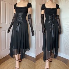 🌹Gothic black stretch evening dress with adjustable lace up ribbon front, a handkerchief hem, a padded bust, short cap sleeves & a zip up the back UK 10, 12 & 14 available🌹 Condition: No faults or marks ✔️ Label: Bernshaw  Size:  UK 10 (W26, B33 & H44 - the top half is a jersey stretch material - the measurements were taken with the lacing relaxed and undone, it can be tightened)  UK 12 (W28, B35 & H46 - the top half is a jersey stretch material - the measurements were taken with the lacing re Black Stretch Corset Dress For Costume Party, Formal Black Corset Back Dress, Formal Black Corset Dress, Formal Black Corset Dress With Corset Back, Black Fitted Bodice Corset For Evening, Gothic Stretch Corset Dress For Party, Black Fitted Corset Dress For Evening, Gothic Black Corset Dress For Formal Occasions, Gothic Black Corset Dress For Formal Events