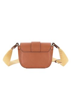 A metallic horseshoe hardware detail calls attention to a foldover flap crossbody with a structured silhouette and adjustable webbed strap. 5.5" H x 8" W x 3.25" D 19-28" strap drop Front flap closure Adjustable crossbody strap Interior slip pocket Manmade exterior/textile lining Imported Brown Top Handle Saddle Bag With Magnetic Closure, Brown Saddle Bag With Top Handle And Magnetic Closure, Classic Brown Shoulder Bag With Logo Strap, Formal Leather Bags With Logo Strap, Brown Flap Saddle Bag With Adjustable Strap, Brown Crossbody Saddle Bag With Detachable Strap, Brown Flap Saddle Bag With Gold-tone Hardware, Brown Saddle Bag With Gold-tone Hardware, Brown Crossbody Flap Bag With Magnetic Closure