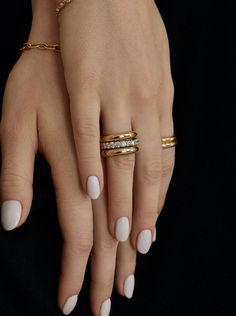 A daily wear ring signifies more than love; it mirrors your unique personality. Our legacy band serves as an exquisite wedding band and offers endless possibilities for stacking and layering with other styles, allowing you to craft your unique stack. Meticulously handcrafted in lustrous 14k yellow gold, this ring embodies unmatched versatility and effortless elegance. With a bandwidth of 2mm, it strikes the perfect balance between delicacy and presence. If you desire to experiment with sizes, we Everyday Fine Jewelry Stackable Rings, Elegant Everyday Stackable Rings, Stackable Midi Rings Fine Jewelry, Luxury Stackable Rings With Thick Band For Wedding, Timeless Stackable Diamond Ring For Everyday, Everyday Fine Jewelry Stackable Rings With Brilliant Cut, Luxury Stackable Rings With Thick Band, Everyday Stackable Round Cut Diamond Ring, Elegant Everyday Rings With Brilliant Cut