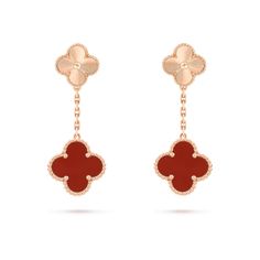 Add a touch of elegance to any outfit with our Clover Earrings in Gold and Carnelian. The intricate design and vibrant gemstones will bring a pop of color to your look. Perfect for any occasion, these earrings offer a unique and stylish way to feel confident and beautiful. ADDITIONAL INFORMATION Color: Gold, Red Stone: Carnelian Ref. VCARO9II00 Material:- 925 Sterling Silver - 18k Gold Plated- 18k Real Gold ( contact us via instagram) Our replica products are committed to quality and color when Luxury Red Sterling Silver Jewelry, Luxury Polished Finish Earrings For Gift, Designer Yellow Gold Drop Earrings, Elegant 14k Gold Gemstone Earrings, Elegant 14k Gold Earrings With Gemstones, Luxury Red Pierced Jewelry, Luxury Red Dangle Jewelry, Luxury Dangle Jewelry With Polished Finish, Designer Dangle Earrings For Formal Events