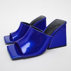 Nwt Metallic Blue Geometric Block Heel Square Toe Mule Sandal, 8 Brand New Zara Block Heel Slides In Blue, 8 Block Heel (~3.7in/9.3cm Heel Height) Slides W/ Square Toe & Shiny Metallic Effect Increased Comfort W/ Airfit Flexible Technical Sole 100% Polyurethane W/ 100% Polyester Lining, 100% Polyurethane Thermoplastic Sole & Mixture Of Sheep Leather (70%) & Polyurethane (30%) Insole Thanks For Looking!!! Modern Summer Party Mules, Modern Blue Mules For Summer, Blue Sandals For Spring Party, Blue Sandals For Party In Spring, Modern Blue Summer Mules, Blue Mules For Summer Evenings, Chic Blue Sandals For Night Out, Modern Blue Sandals With Block Heel, Blue Block Heel Sandals For Party