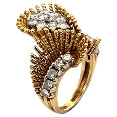 a gold ring with diamonds on it