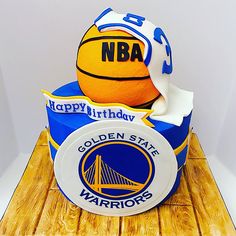 a birthday cake made to look like a golden state warriors basketball