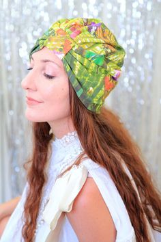 This wearable art fashion turban features exclusive fabric created from Mademoiselle Mermaid's flower photography!! Cotton jersey knit is super soft 'n lovely to wear and really comes to life in a gorgeous tropical butterfly print. A perfect hair turban for early morning meditations, art walks, film festivals, and leisurely weekend brunches. Tuck your hair up into it for a 1920's take on the item, or let your hair fall loose for a more bohemian vibe. ...Add a sparkly rhinestone jewel for a glamo Spring Beach Turban Adjustable, Multicolor Summer Turban, One Size Fits Most, One Size Spring Beach Turban, Summer Wrap Turban, Bohemian Spring Beach Turban, Summer Beach Turban Headband, Adjustable Wrap Turban For Summer, Adjustable Summer Wrap Turban, Bohemian Wrap Turban One Size