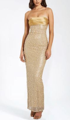 This stunning gold satin maxi dress is adorned with intricate sequins and delicate pearls, creating a truly luxurious and exclusive piece. Its flowing silhouette and exquisite detailing make it the perfect choice for any glamorous occasion. Elevate your wardrobe with this opulent dress. Materials: Sequin & Pearl Beaded Fabric / Double Duchess Satin Length from underarm: Approx 52 inch / 132 cm Stretch Factor: Non Stretch Clean: Dry-clean only Colour may vary due to lighting on images. The produc Golden Birthday Outfit Women, Pearl Prom Dress, Spring Dance, 18th Bday, Gold Maxi Dress, School Dance Dresses, Birthday Outfit For Women, Beaded Maxi Dress, Beaded Fabric