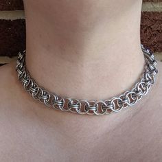 "Helm is an incredibly versatile chainmaille weave. It's one of my most popular styles for both men and women. This necklace is just the right amount of chunky and has a wonderful weight to it making it a delight to wear. It looks great as either a short choker, or as a longer neck chain. Check out the matching bracelet... https://www.etsy.com/listing/737839755/chunky-helm-weave-chainmaille-bracelet Or my other Helm Weave items here! https://www.etsy.com/shop/ZenJumpsChainmaille?ref=simple-shop- Chainmaille Bracelet Weave Got Maille, Chainmaille Bracelet Rocks N Chains, Chainmaille Jewelry Rocks N Chains, Cheap Chain Jewelry For Festivals, Homemade Chain Necklaces, Luxury Metal Chainmail Jewelry, Chainmail Ring Patterns, Chainmail Patterns Necklaces, Chainmail Jewelry Set