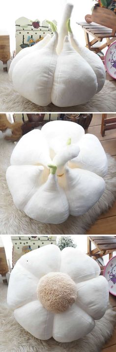 three different views of the same flower shaped pillow