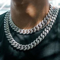 These attention-grabbing and bold chains guarantees to leave a strong impression, and set you apart from the rest. The prong-set AAA grade CZ stones promises a brilliant sparkle and glitter like no other. It’s no wonder they are adored and worn by famous and successful athletes, hip hop rap artists and entrepreneurs al Silver Chain Link Jewelry For Streetwear, Iced Out Diamond Necklace For Streetwear, Iced Out Cuban Link Diamond Necklace In White Gold, Iced Out Crystal Chain Link Jewelry, Silver Link Jewelry For Streetwear, Dazzling Cuban Link Bling Jewelry, Dazzling Cuban Link Jewelry With Bling, Streetwear Iced Out Jewelry With Cubic Zirconia, Iced Out Cubic Zirconia Jewelry For Streetwear