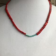 Pretty and colorful beach inspired necklace featuring Red Coral and a few Hubei Turquoise beads to add a pop of color. Clasp is a 14k gold filled Lobster claw. Beads are strung on 49 strand beading wire that is secured with 14k gold filled crimp, cover and wire guardians. Necklace is 18 inches Visit my shop for more jewelry designs: https://www.etsy.com/shop/EarthSeaSkyJewelry Handmade Southwestern Beaded Necklaces For Beach, Bohemian Hand-strung Beaded Necklaces For Beach, Handmade Coral Beaded Necklaces Spiritual Style, Handmade Coral Beaded Necklaces For Spiritual Use, Handmade Southwestern Necklace For Beach, Handmade Spiritual Coral Beaded Necklaces, Bohemian Gemstone Beaded Necklaces For Vacation, Bohemian Red Necklaces For The Beach, Bohemian Coral Jewelry For The Beach