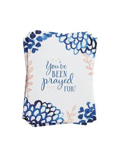 a blue and white flowered napkin with the words you're been praying for