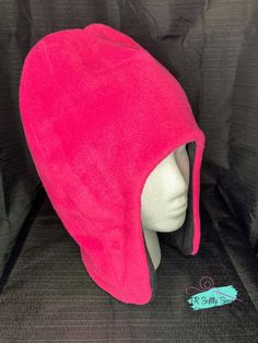 This hat is made with two layers of soft fleece fabric. The style is made so you can flip it to have either color on the outside. Keeps your head, ears, and neck warm during the cold months. If you are interested in a different color combination please message the shop and I can see if I have or can get the colors. The hats run on the larger size so if you are unsure of size and want it to fit snug I would size down. The hats do have some stretch to them as well.  Approximate Circumference  3-4 Hat With Ear Flaps, Fleece Hat, Ear Hats, Creating A Business, Winter Weather, My Side, Neck Warmer, Color Combination, Fleece Fabric