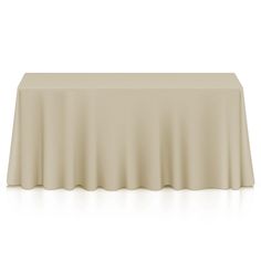 an empty table with a white cloth on it and the top half covered by a plain sheet