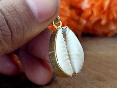 Handmade Cowrie Shell bohemian pendant Title -Cowrie Shell pendant Stone color - White Material - Sterling silver 925 we are giving you best quality rings on best price .. contact us for more quantity Bohemian Pendant Jewelry For Rituals, White Bohemian Pendant Necklaces, Handmade White Amulet Jewelry, Festival Pendant Jewelry With Charms, Bohemian Nickel Free Oval Pendant Necklace, Bohemian Round Pendant Jewelry For Rituals, Bohemian Nickel-free Oval Pendant Necklace, Bohemian Jewelry Gift For Her With Round Pendant, Artisan Locket Necklaces For Gift