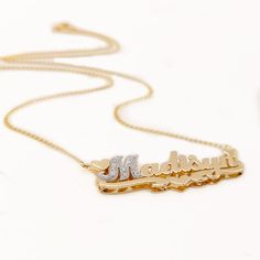 "Personalized gold and diamond 3D name necklace 1.50\" wide made of solid 14k Yellow gold and first letter in Diamonds. The necklace suspends from a Cuban Link chain with 4 choices of length: 14\",16\", 18\" and 20\". The necklace can be made with the name of your choice up to 9 letters. A Great gift for Christmas Valentines, Birthday, Anniversary or any other occasion. Contact us for pricing if your name has more than 9 letters. Please use the note section available at checkout to let us know t Anniversary Nameplate Name Necklace With Hallmarks, Yellow Gold Necklaces With Names For Anniversary, Anniversary Yellow Gold Name Necklace, Gold Name Necklaces For Anniversary, Gold Plated Nameplate Necklace For Anniversary, Yellow Gold Custom Nameplate Necklace For Anniversary, Custom Yellow Gold Nameplate Necklace For Anniversary, Gold Necklaces With Names For Anniversary, Luxury Gold Name Necklace With Custom Name