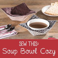 several bowls filled with soup on top of a wooden table next to napkins and spoons