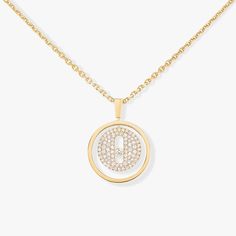 Worn to accentuate a neckline with a touch of elegance or layered with another diamond necklace for an on-trend look, the Lucky Move medallion pendant with pavé diamonds is the new timeless diamond jewel by Messika. Set with diamonds, this yellow gold diamond necklace reimagines the famous Move motif with pure elegance. You’ll love its chain, which has a sliding system that makes it possible to adjust the diamond necklace to the length of your choice. You'll love this yellow gold diamond necklac