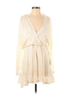 Free People Cocktail Dress Size: X-Small Ivory Dresses - used. 80% ACRYLIC, 13% NYLON, 7% WOOL, Plunge, Short, Long Sleeve | Free People Cocktail Dress: Ivory Dresses - Used - Size X-Small Cream Bohemian V-neck Mini Dress, Ivory Cocktail Dress, Ivory Dresses, Short Long, Free People, Cocktail Dress, Women Handbags, Womens Dresses, Handbags