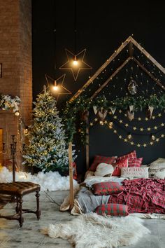 a bedroom decorated for christmas with lights and decorations