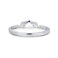 a white gold wedding ring with two hearts on the side and an arrow shaped band