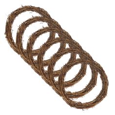 four pieces of brown rope are arranged in a spiral pattern on a white background with clippings for text