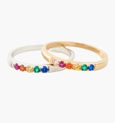 Meet our Mini Rainbow Band Ring- this whimsical piece is adorned with an arc of meticulously selected CZ stones, each shimmering with the joyous hues of the rainbow. Perfect for the color-loving daydreamer, this ring is more than an accessory—it's your very own piece of wearable joy. Fine Jewelry Rainbow Multi-stone Rings, Rainbow Multi-stone Birthstone Ring For Anniversary, Anniversary Rainbow Multi-stone Birthstone Ring, Anniversary Multi-stone Rainbow Birthstone Ring, Rainbow Colored Fine Jewelry Rings For Anniversary, Wedding Rainbow Multi-stone Rings, Adjustable Rainbow Gemstone Ring, Rainbow Ring Jewelry For Wedding, Rainbow Multi-stone Jewelry For Wedding