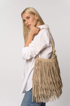 Beige Leather Fringed Bag. Handmade Shoulder Bag. Native American inspired..but for the Woman of today Timeless Design..that is alway's in Fashion! A Beautiful Bag..for impressive excursions in life! 4 layers of fringes moves alon with you!. Practical and Beautiful. The zipper closure make it easy to open and close the Bag for all day's activity. Available in Black or Dark brown color if wanted. It has the unique look of a Handmade work. Height of the Bag-11 inches or 28 cm. Widdth-13 inches or Leather Fringe Bag, Handmade Leather Bag, Fringe Handbags, Fashion Festival, Fringe Bags, Long Fringes, Boho Bags, Dark Brown Color, Suede Fringe