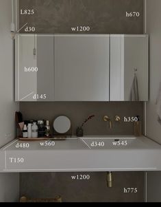 the measurements of a bathroom sink and mirror