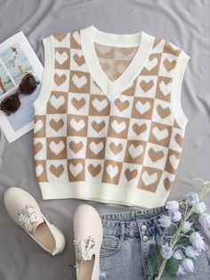 Trendy Beige Tank Vest, White V-neck Tank Top For Winter, Beige Tank Sweater Vest Casual Style, Casual Beige Tank Sweater Vest, Trendy Cream Sleeveless Tank Top, Trendy White Summer Sweater Vest, Trendy White Winter Tank Top, Trendy White Sweater Vest For Summer, Casual Brown Summer Sweater Vest