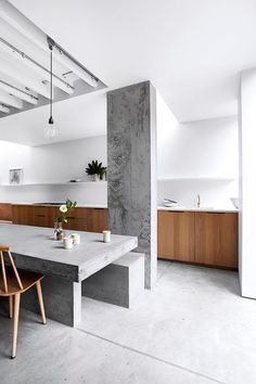 the kitchen is clean and ready to be used as a dining room or living area