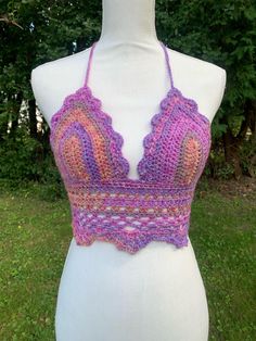 SIZE SMALL/MEDIUM Handmade crochet boho beach top. Made with acrylic yarn. Handwash gently and let air dry. Crochet Lace V-neck Crop Top For Summer, Bohemian V-neck Halter Top For Summer, Summer Festival V-neck Halter Top, Bohemian V-neck Crop Top For Beach Season, Summer Crochet Lace Top Made Of Yarn, Summer V-neck Crochet Crop Top, Festival Crochet V-neck Crop Top, Summer V-neck Crochet Top, V-neck Crochet Top For Summer