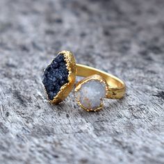 GemFormingStudio D E T A I L S Black Druzy Ring | Gemstone Ring | Rose Gold Ring, Brass Ring, Gold Plated Ring, Ring For Women, Ring For Her, Gift For Her, Unique Jewelry Ring Size : All Sizes Available Size : 20 x 10 mm Approx Weight : 5.50 Gm Color : White , Gold Shape : Marquise , Heart Material : Brass . Contact us for wholesale prices. R I N G S https://www.etsy.com/in-en/shop/GemFormingStudio?section_id=22783374 B E A D S https://www.etsy.com/in-en/shop/GemFormingStudio?section_id=22828835 Gift Rings With Raw Stone, Gift Rings With Raw Stone In Open Ring Shape, Round Raw Stone Promise Rings, Raw Stone Promise Ring, Adjustable Raw Stone Promise Ring, Gift Crystal Open Ring With Raw Stone, Promise Ring With Raw Stone Crystal Open Ring, Crystal Open Ring With Natural Stones For Anniversary, Natural Stones Crystal Open Ring For Anniversary