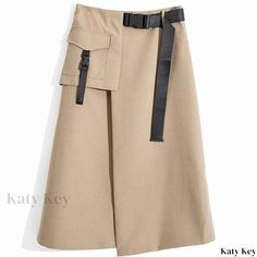 Katykey - Chic Beige High-Waisted Split Irregular Midi Skirt - Figure-Flattering and Knee Length Elegant Asymmetrical Bottoms With Pockets, Asymmetrical Beige Bottoms For Work, Fall Skirt With Pockets And Asymmetrical Hem, Beige Asymmetrical Bottoms For Work, Chic Asymmetrical Skirt With Pockets, Chic Bottoms With Belt Loops And Asymmetrical Hem, Asymmetrical Solid Skirt With Pockets, Solid Asymmetrical Skirt With Pockets, Asymmetrical Skirt With Pockets For Fall