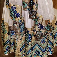 Beautiful Ethiopian and Eritrean Habeshan Dress. Stylish Menen, 100% Cotton We recommend hand washing and air drying to make it last longer. A low heating iron will also keep design and look. Cotton Habeshan Dress, Ethiopian Dresses, Eritrean Dress, Ethiopian Beauty, Beautiful Ethiopian, Habesha Dress, Ethiopian Traditional Dress, Ethiopian Dress, Habesha Kemis