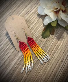 the earrings are made from seed beads