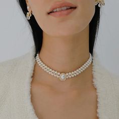 A sumptuous combination of sophistication and beauty, this vintage inspired Pearl Ladies Choker will effortlessly elevate every outfit, giving you a high fashion edge at all times. To keep your jewellery in the best condition, we recommend giving it a good care over time. By using a soft, lint-free jewellery cloth, you can remove blemishes that result from body oils, perfumes and lotions. Also remember try not to expose your jewellery in the open air. Our branded dusty bag or your jewellery box will keep them last longer. If you go to gym or spa, remember to take them off, because water or sweat will also damage them. Luxury Bridal Pearl Chain Necklace, Elegant Pearl Chain Jewelry, Elegant Gold Pearl Choker, Elegant Bridal Choker Necklace, Elegant Pearl Choker Necklace, Elegant Pearl Necklaces With Jewels, Elegant Gold Bridal Necklace, Elegant Pearl Chain Jewelry For Parties, Luxury Pearl Chain Choker Jewelry