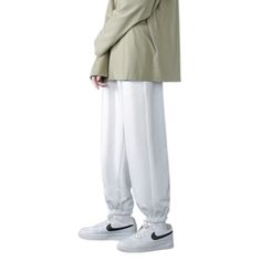 The Baggy Wide Leg Casual Sweatpants are the ideal winter companion for men who want functionality and flair in their wardrobe. Made from high-quality fabrics, these pants offer a comfortable and toasty fit, making them suitable for the chilly season. But that's not all! You won't ever have to worry about carrying your essentials separately because of the numerous compartments that were thoughtfully positioned throughout the design. Specifications: Applicable Season: Spring and Autumn Applicable White Baggy Pants For Outdoor, Relaxed Fit Full Length Pants For Winter, Casual Winter Leisure Bottoms, Full Length Relaxed Fit Pants For Winter, Winter Full Length Pants With Relaxed Fit, White Wide Leg Bottoms For Outdoor, White Wide-leg Bottoms For Outdoor, Winter Full Length Relaxed Fit Pants, Full Length Bottoms For Leisure In Winter