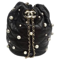 Chanel About Pearls Black Lambskin Drawstring Bucket Bag | From a unique collection of rare vintage Bucket Bags and Drawstring Bags at https://www.1stdibs.com/fashion/handbags-purses-bags/shoulder-bags/bucket-bags-drawstring-bags/. Chanel Mini Bag, Mini Chanel, Tas Lv, Mode Chanel, Chanel Store, Studded Bag, Chanel Mini, Drawstring Bucket Bag, Chanel Logo