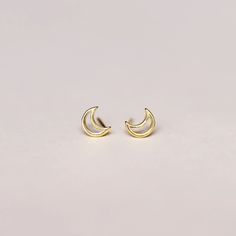 gold moon stud earrings by jaxkelly Dainty Crescent Earrings For Everyday, Gold Moon Shaped Cartilage Earrings, Gold Moon-shaped Cartilage Earrings, Dainty Half Moon Charm Earrings, Minimalist Gold Cartilage Earrings With Moon Charm, Gold Minimalist Cartilage Earrings With Moon Charm, Dainty Half Moon Earrings With Moon Charm, Minimalist Yellow Gold Earrings With Moon Charm, Dainty Moon Phase Earrings