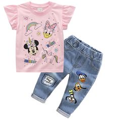 Minnie Mickey Kids 2Pc Set T-shirt + Jeans Elevate your child's summer style with this adorable Minnie Mickey Mouse 2-piece clothing set. Crafted for comfort and cuteness, this set includes a charming cartoon-themed T-shirt paired with trendy jeans pants. Ideal for both baby girls and boys, this tracksuit ensemble ensures your little one is fashion-forward and ready for any adventure. Whether it's a playdate or a family outing, this summer outfit is a must-have addition to your children's wardro Cute Cotton Sets With Character Print, Cute Cotton Cartoon Print Sets, Cute Cotton Sets With Cartoon Print, Trendy Spring Playtime T-shirt, Casual Cotton Sets With Character Print, Pink Cotton Character Print Sets, Spring Character Print Short Sleeve Sets, Pink Cotton Sets With Character Print, Spring Short Sleeve Sets With Character Print